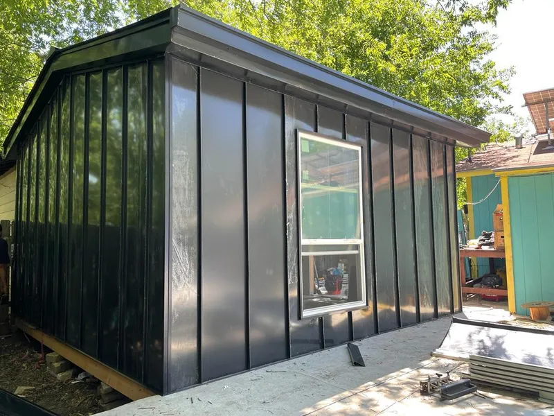 Black standing seam metal wall panels for Roof Inspection in Abilene