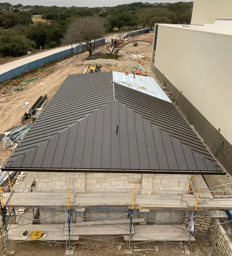 Metal roof new construction with scaffolding in Abilene
