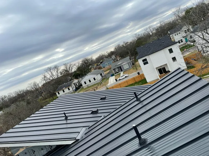 Standing seam metal roof panels with vents for Skylight Repair in Abilene